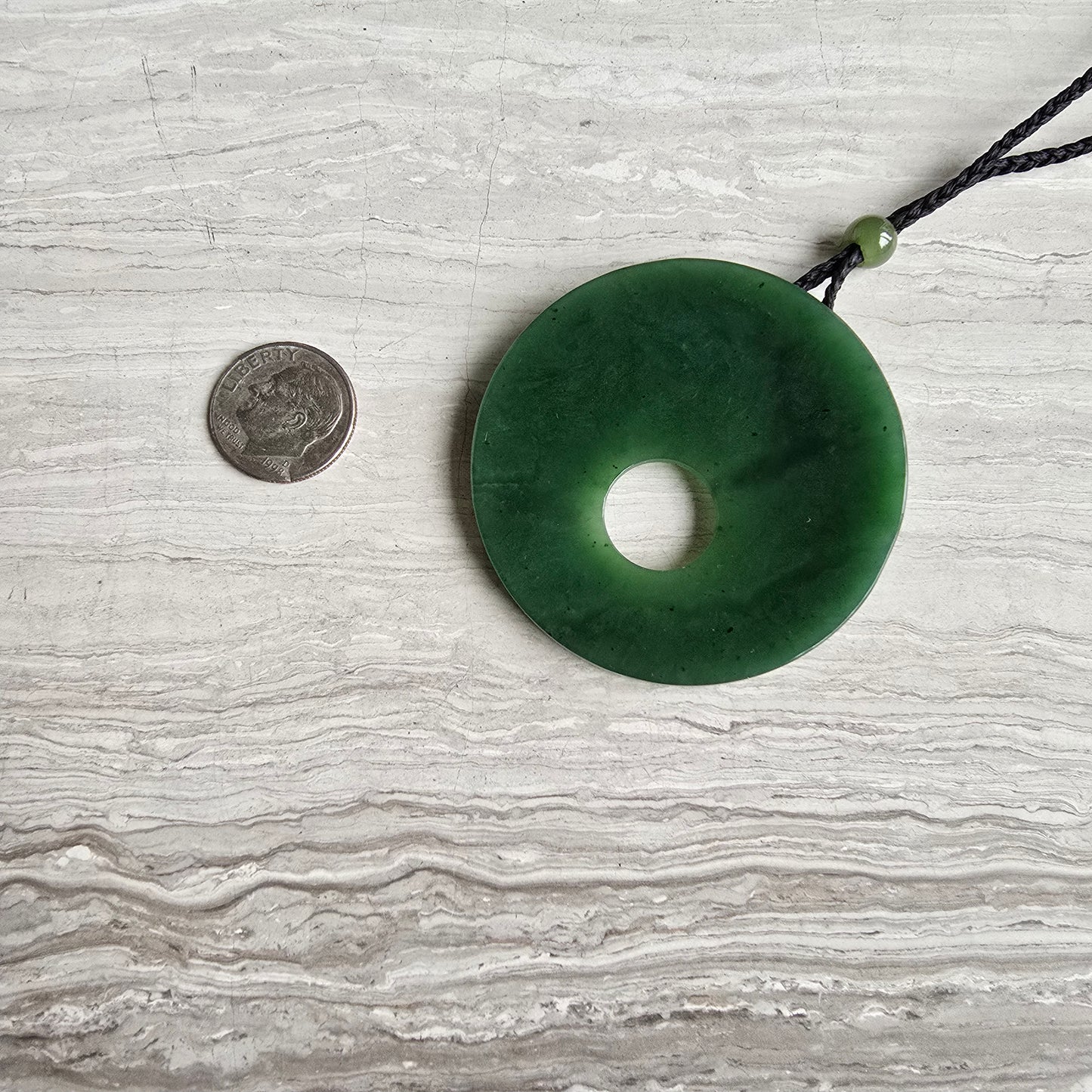 Siberian jade round disk necklace with an adjustable cord necklace