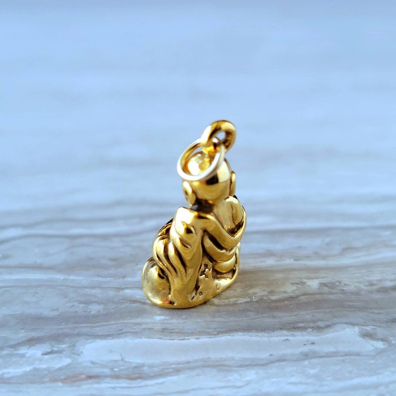 Gold laughing buddha pendant