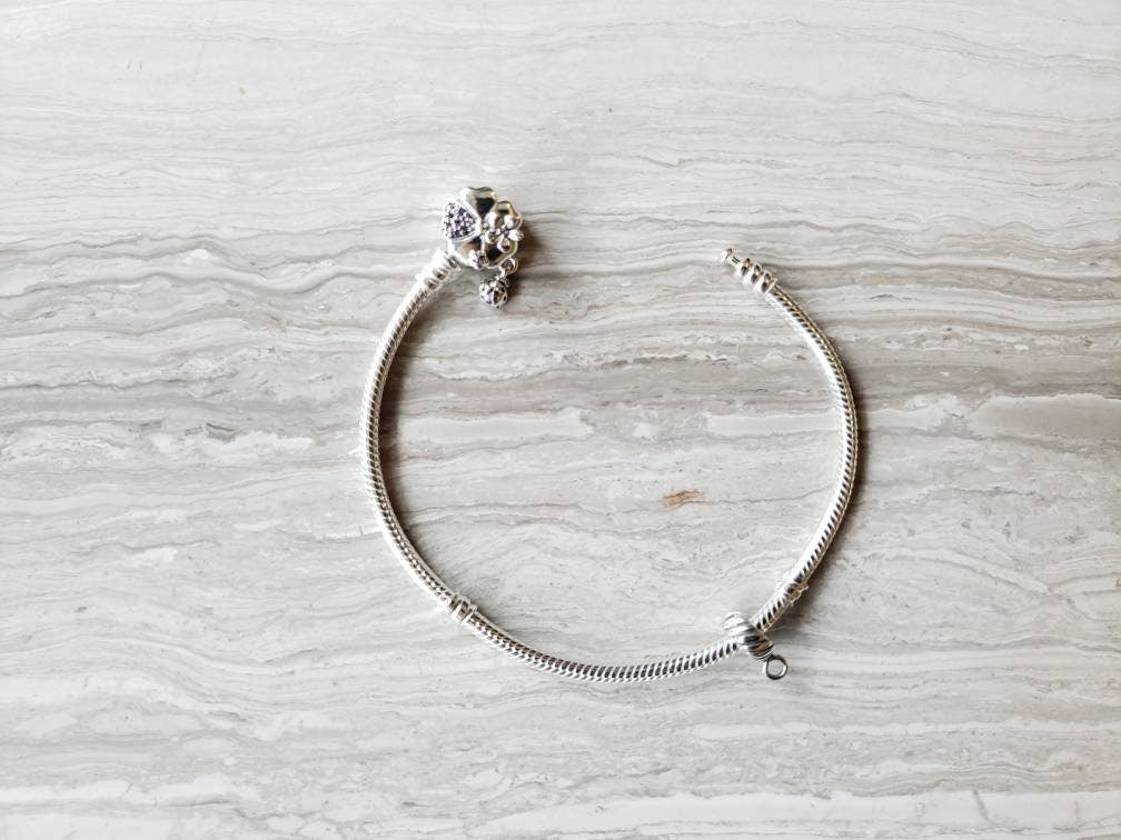 Silver charm bead holder compatible with Pandora and Trollbead