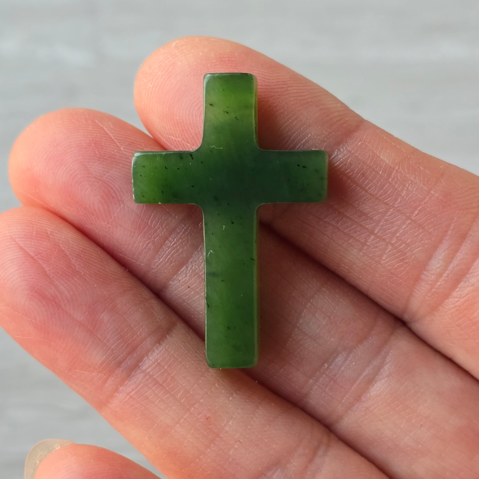jade cross with a side drill hole