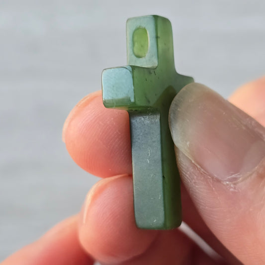 jade cross with a side drill hole