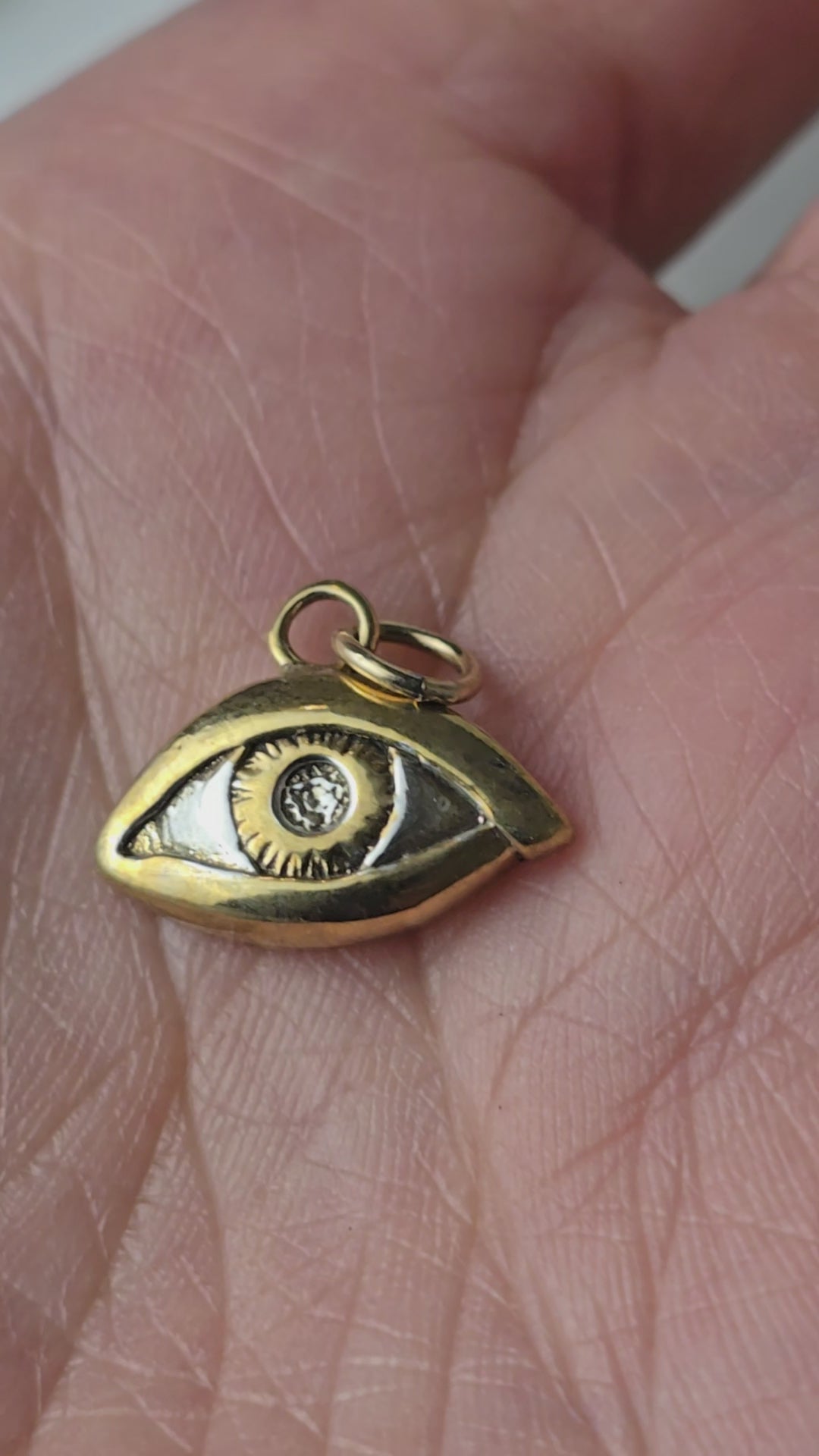 Silver and Gold evil Eye charm
