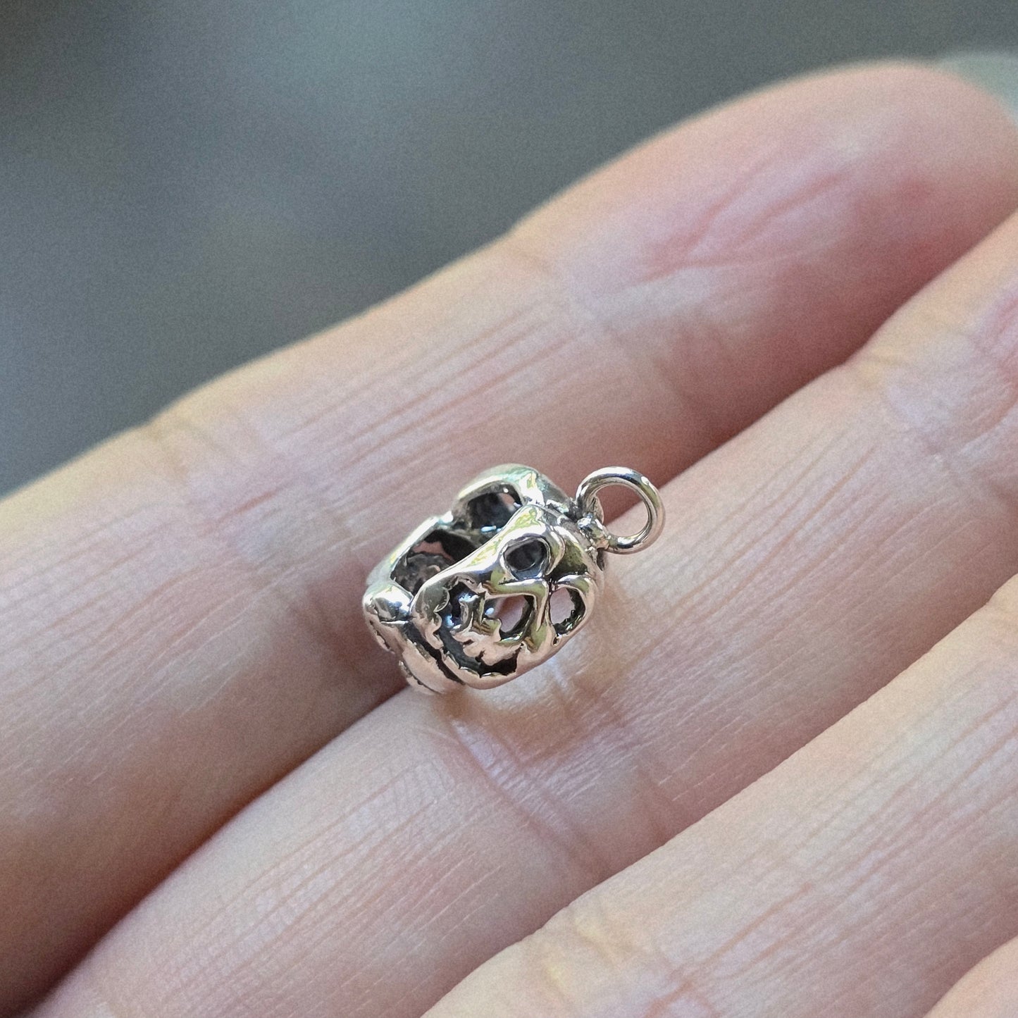 Silver skull charm holder compatible with Pandora bracelets