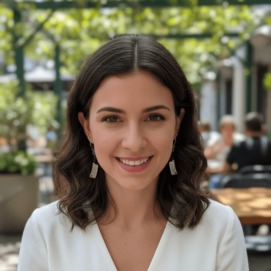 woman wearing edgy silver cleaver earrings