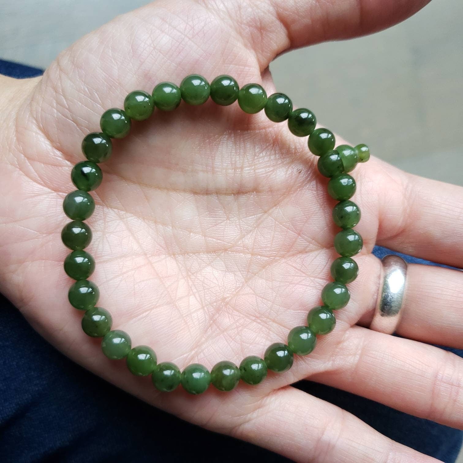 genuine jade bead mala bracelet detail