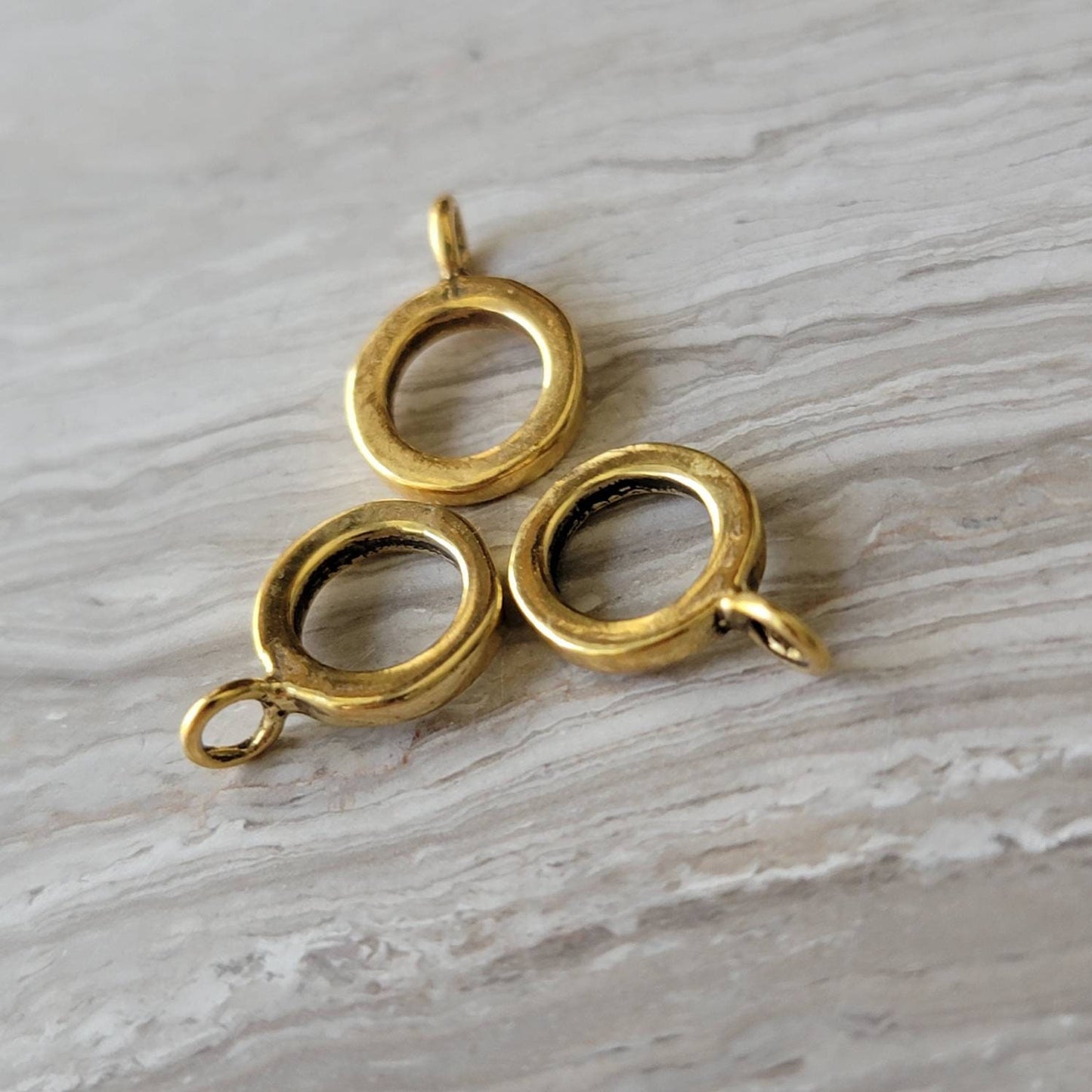 gold charm bead holder