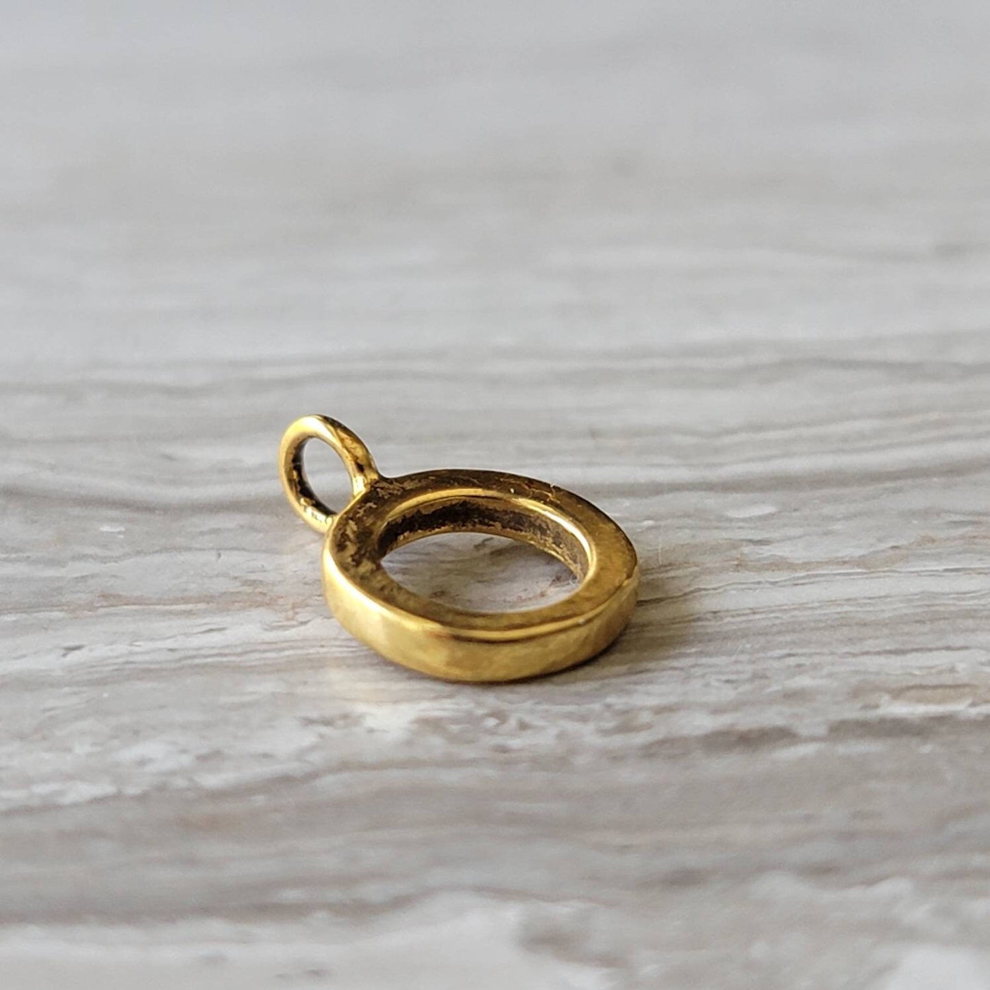 gold charm bead holder