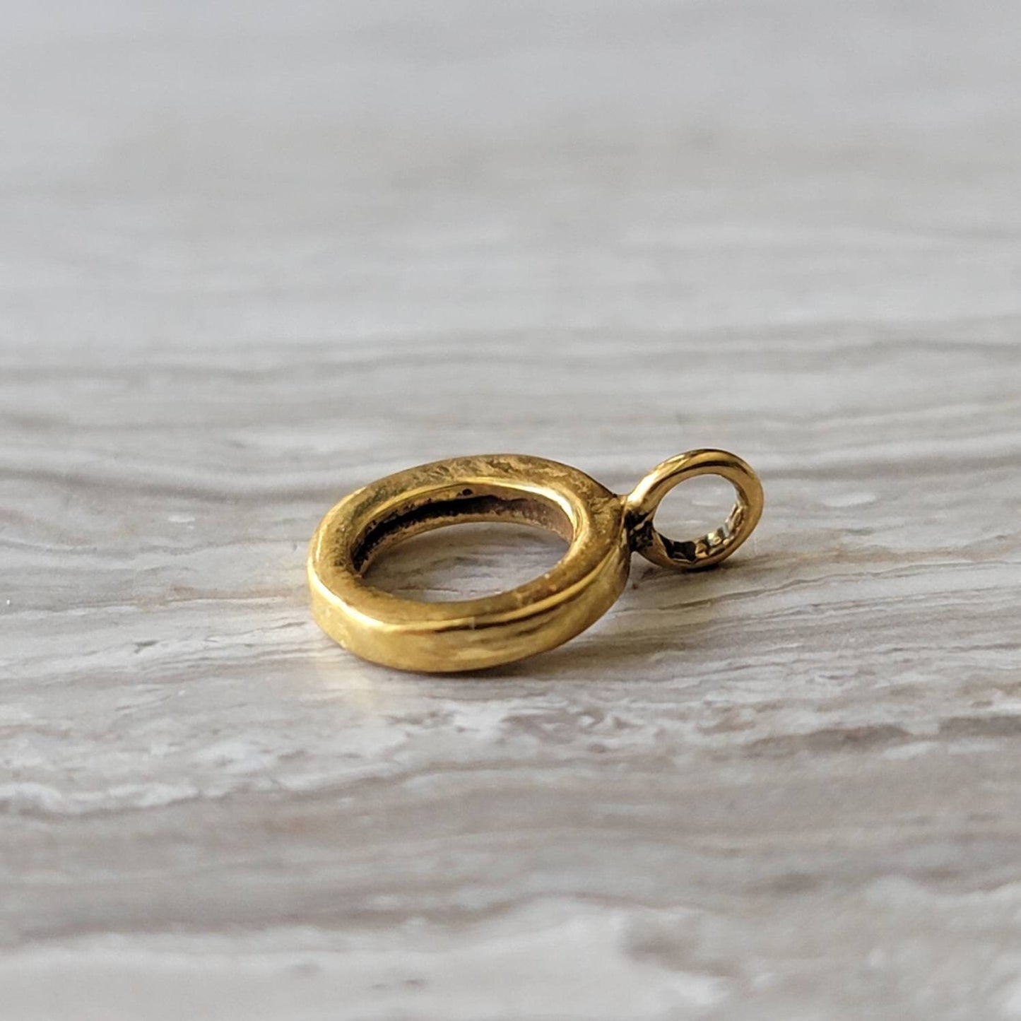gold charm bead holder