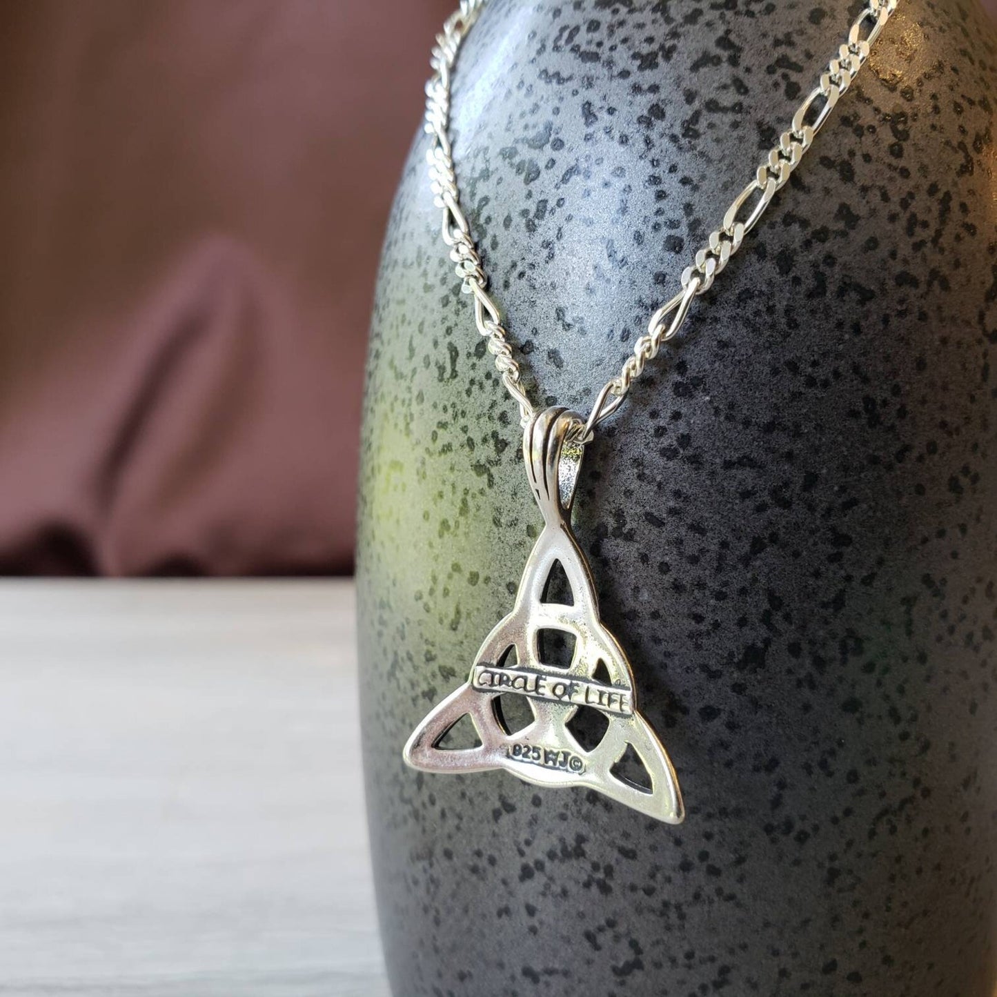 silver and gold celtic trinity lover's knot