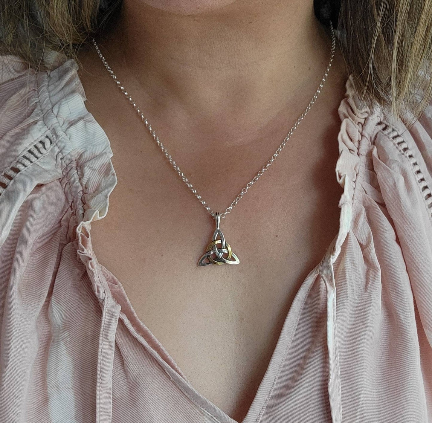 silver and gold celtic trinity lover's knot