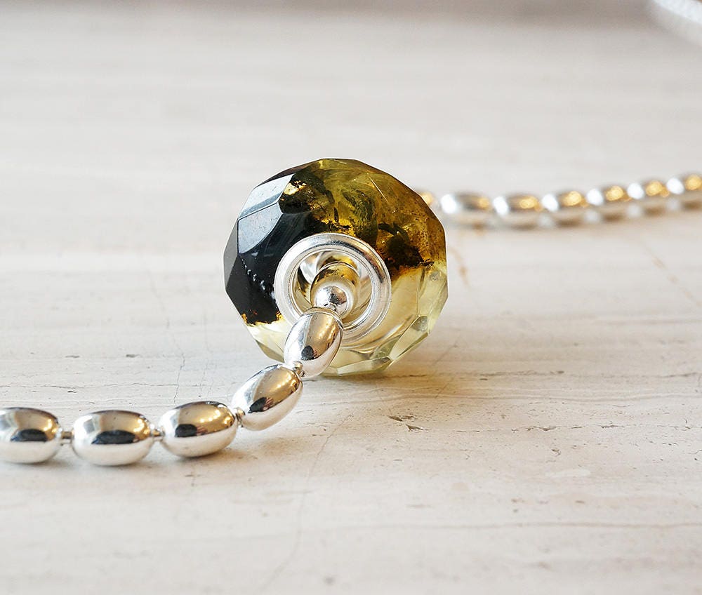 Black and white baltic amber bracelet bead polished facets