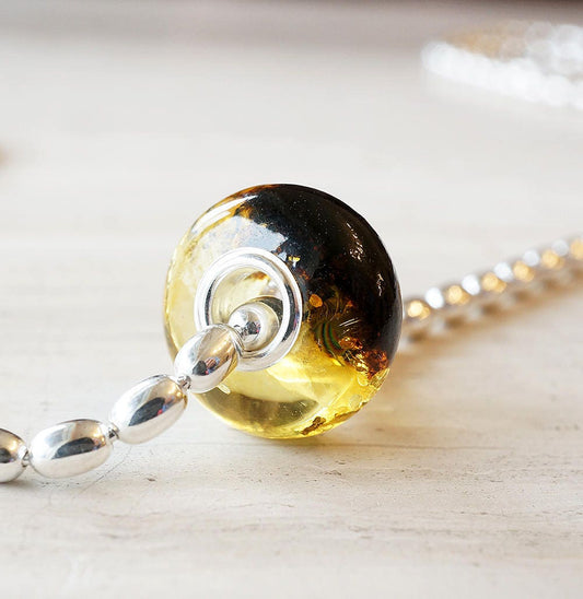 Genuine Baltic Amber Bead with Sterling Silver Core- Black and Light Honey Color