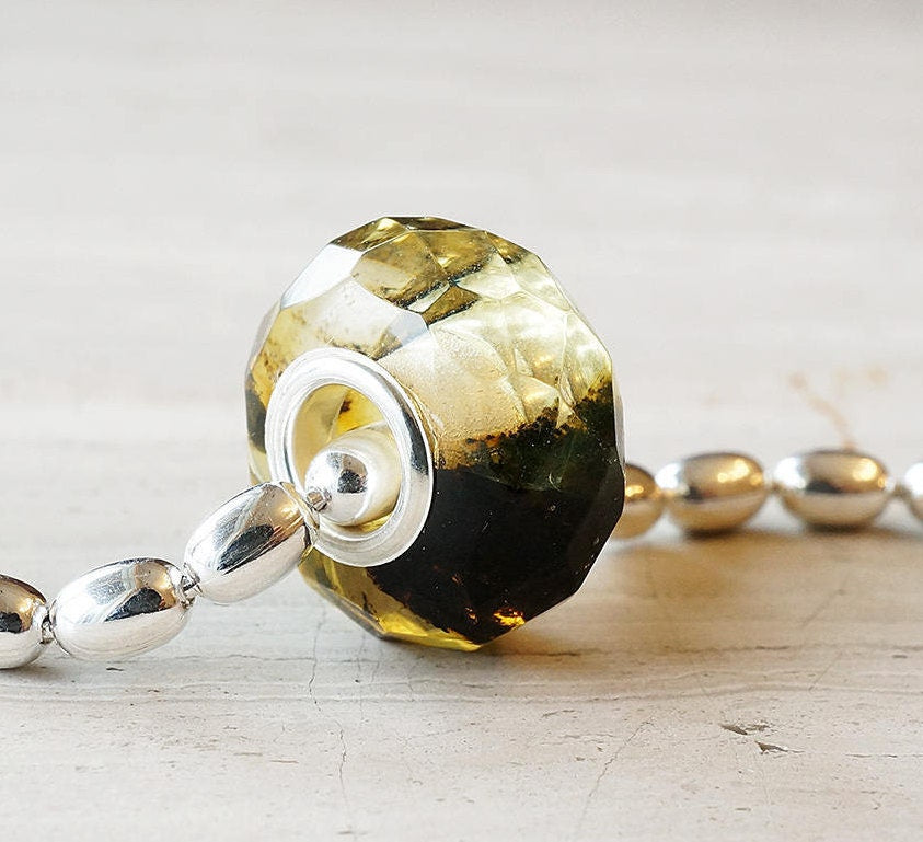 Black and white baltic amber bracelet bead polished facets