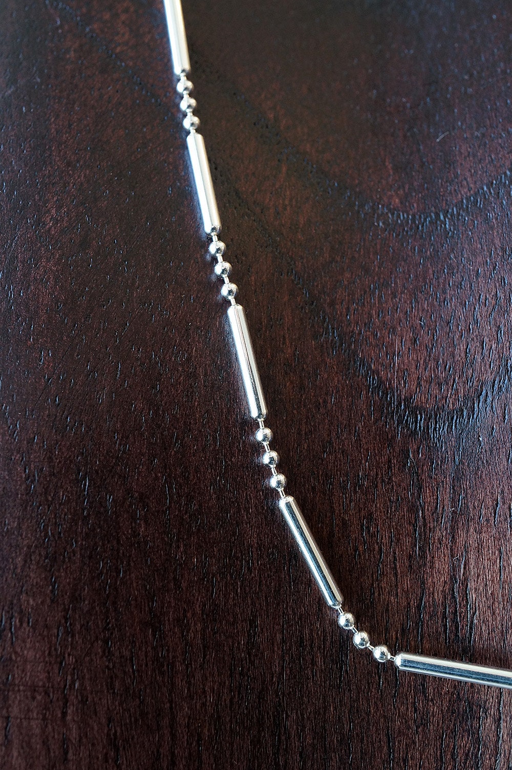 Silver long bar and bead chain necklace