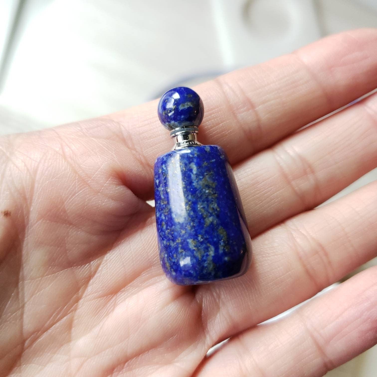 A lapis lazuli bottle pendant