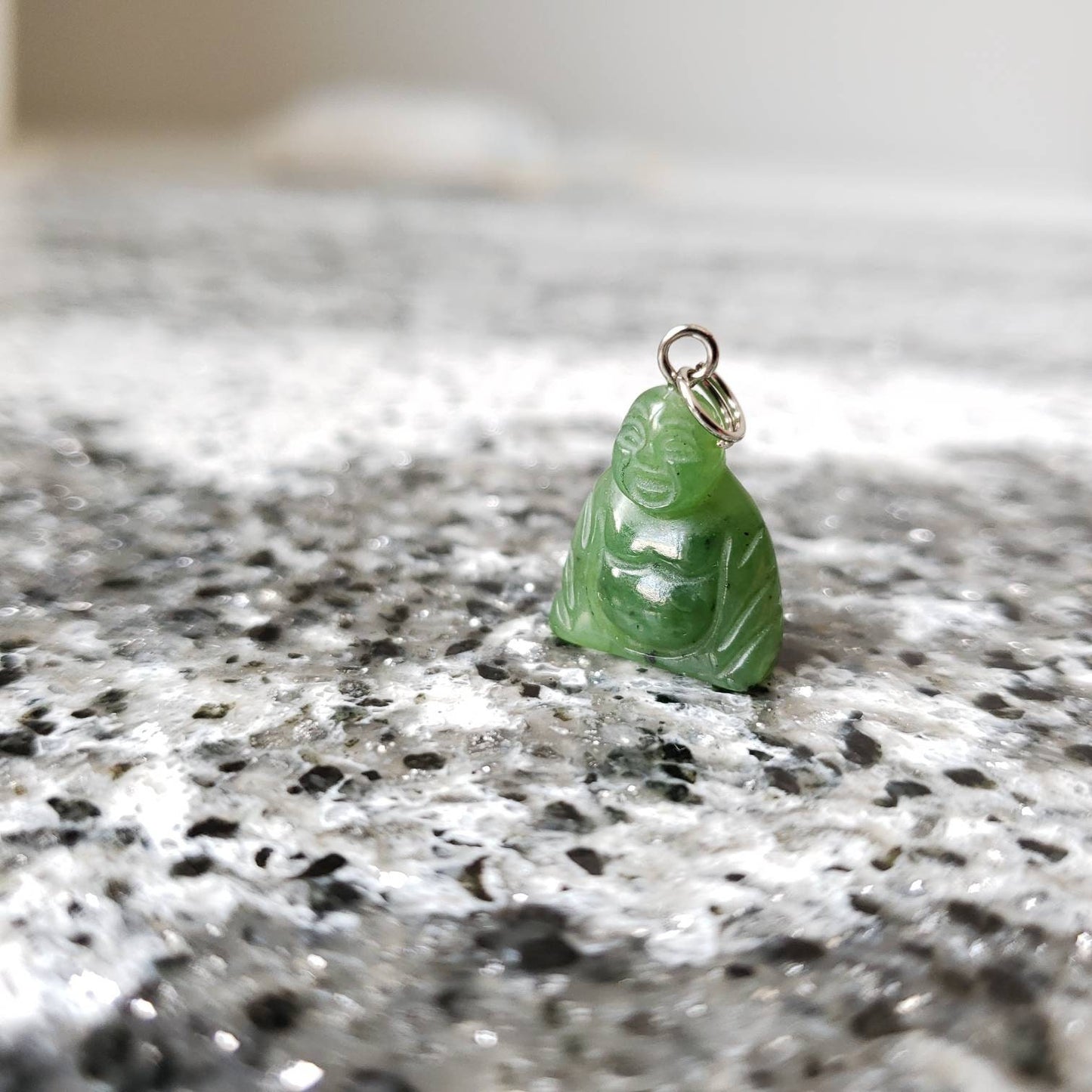 small laughing buddha charm