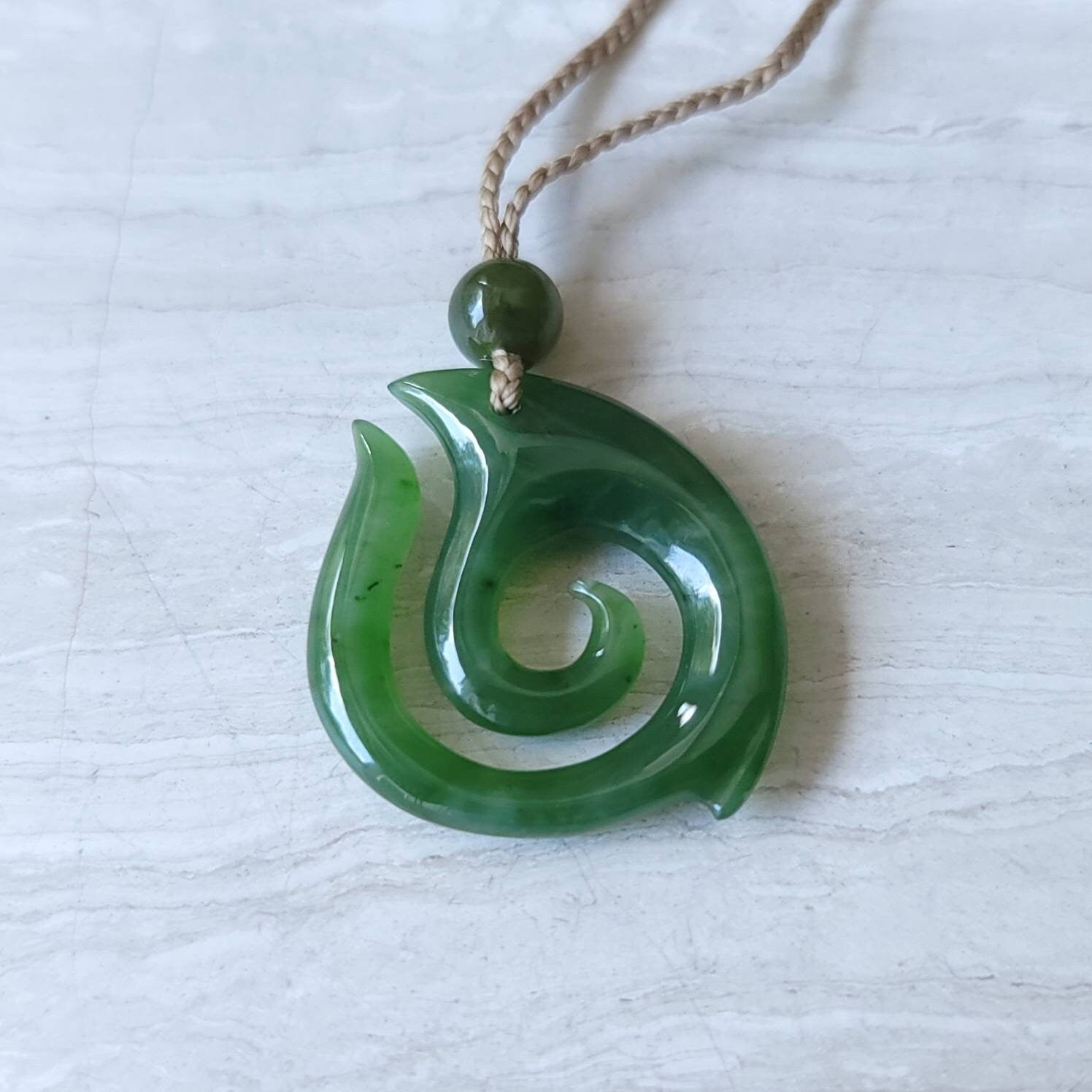 jade maori fish hook necklace