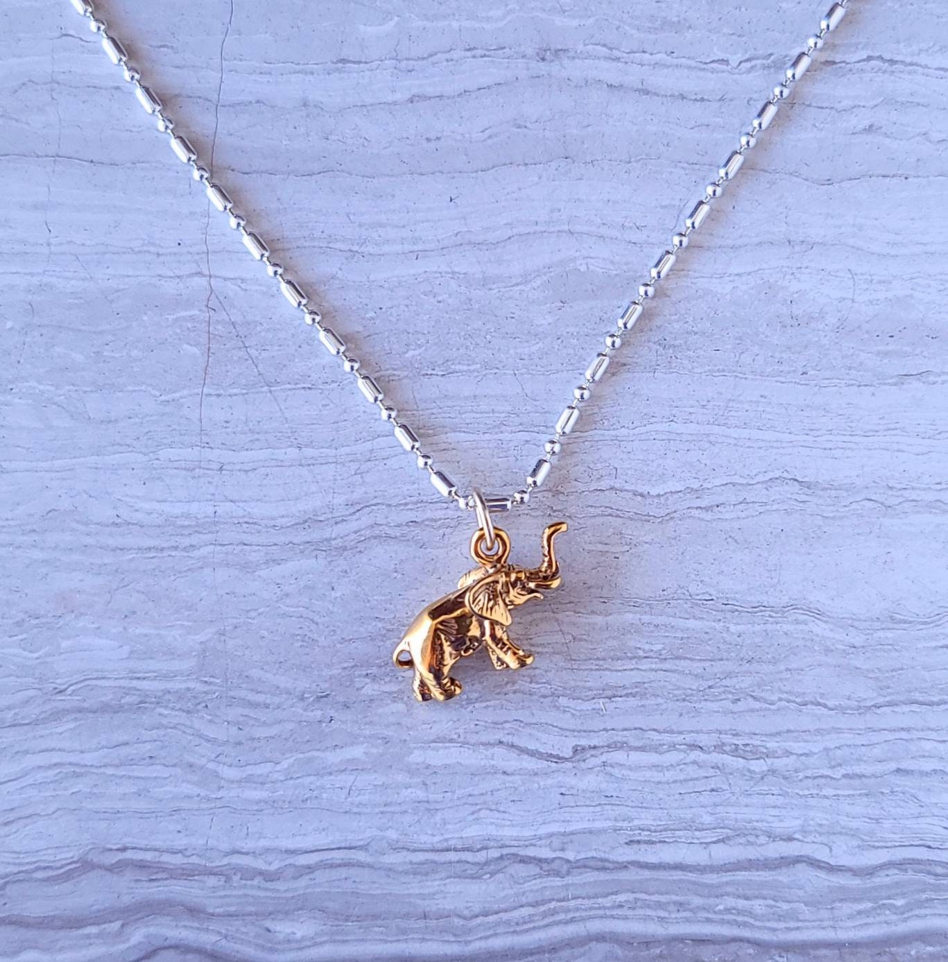 Gold elephant charm