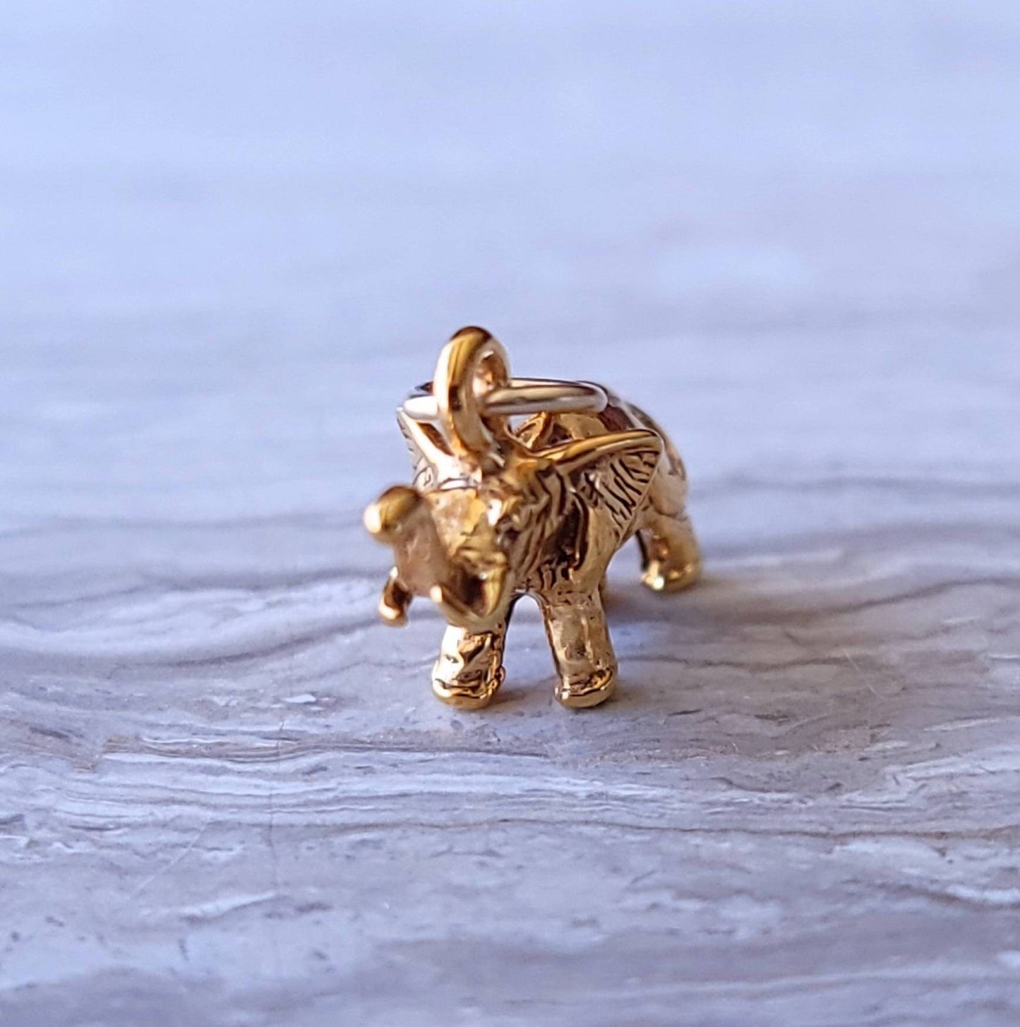 Gold elephant charm