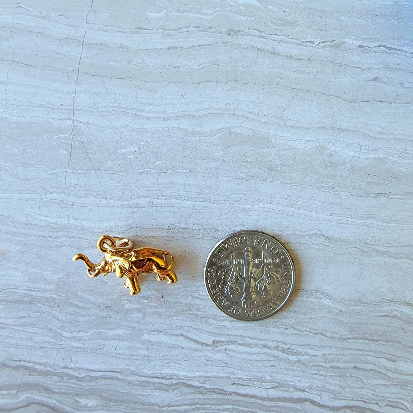 Gold elephant charm