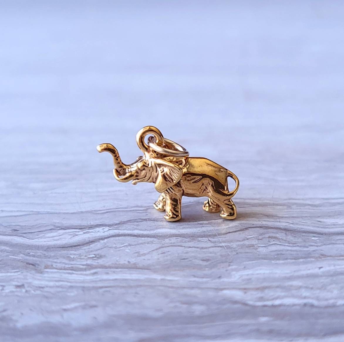 Gold elephant charm