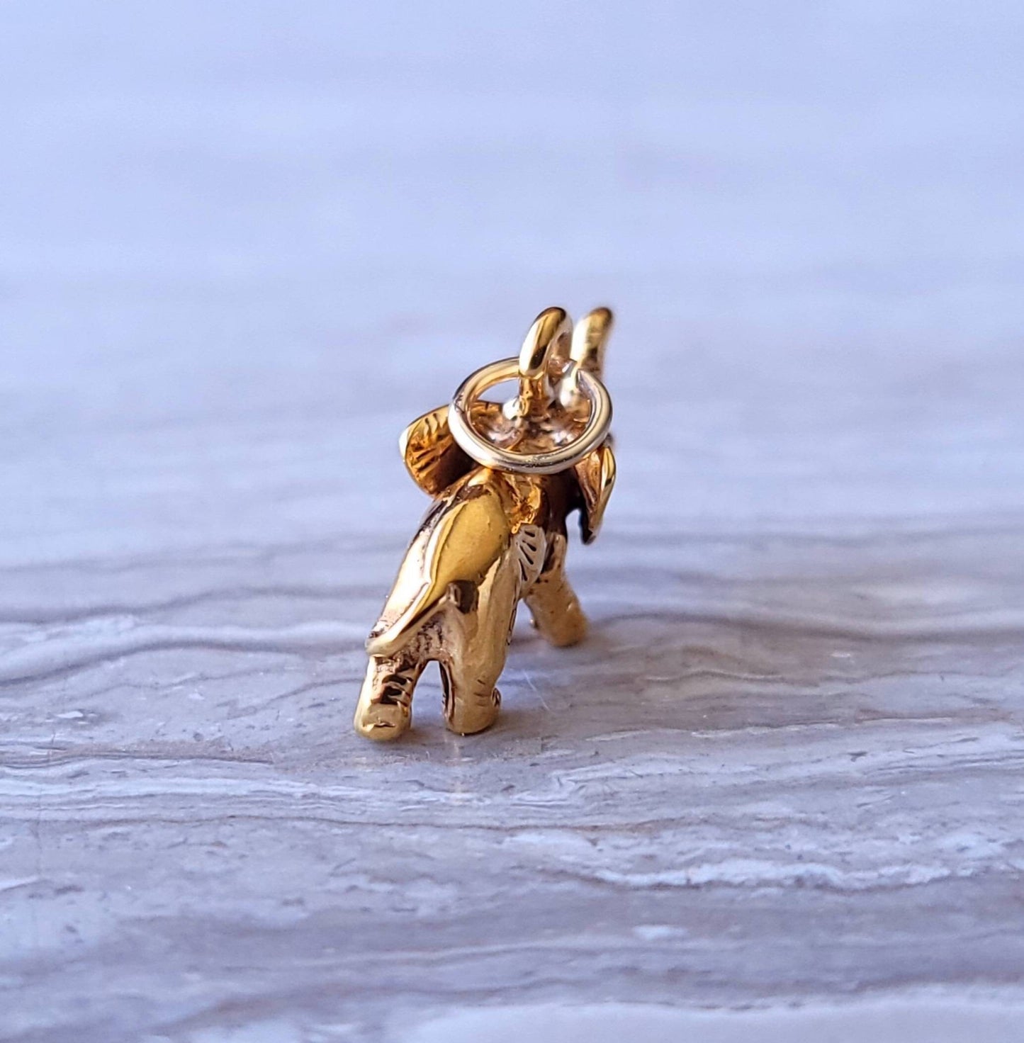 Gold elephant charm