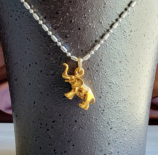 Gold elephant charm