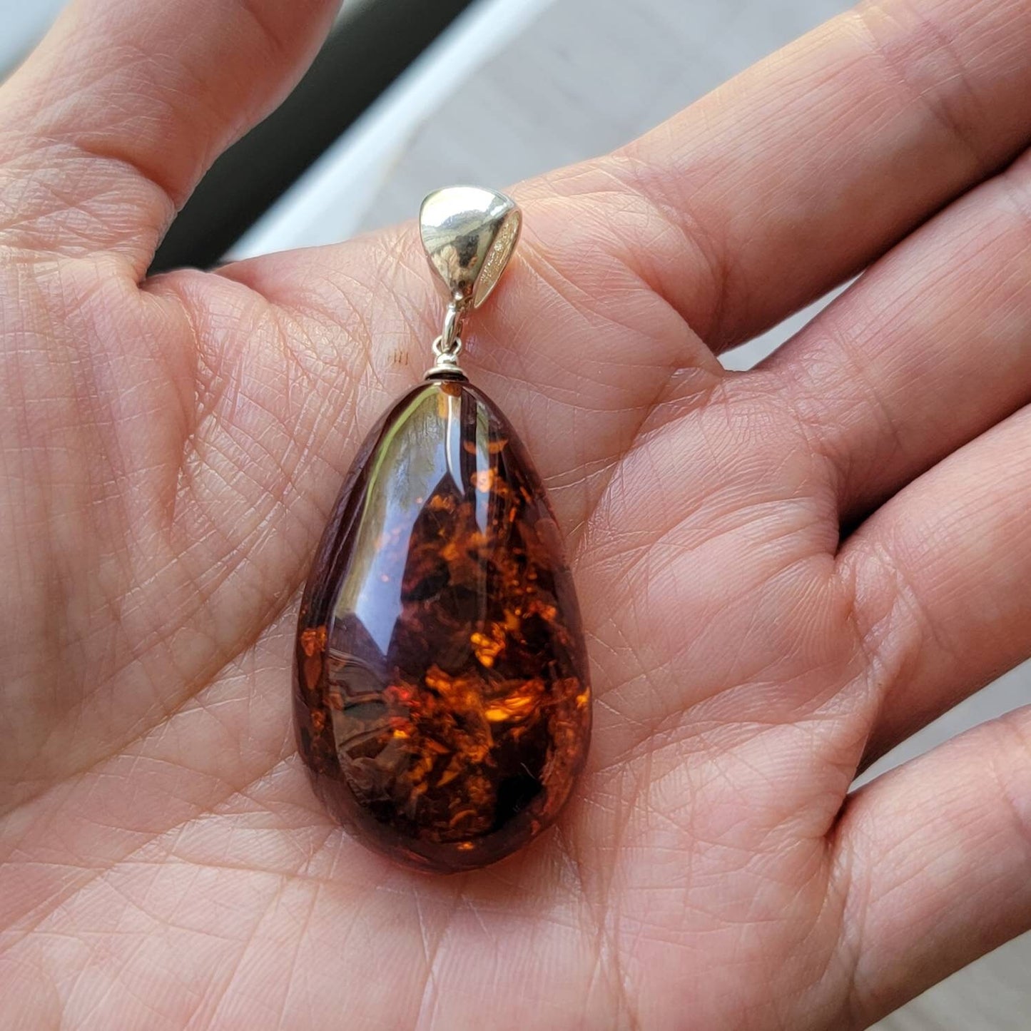 baltic amber teardrop pendant with sterling silver bail