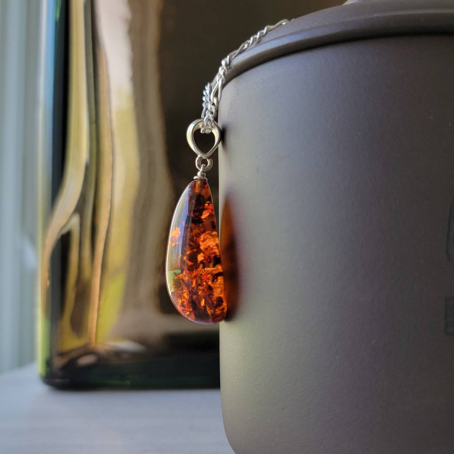 baltic amber teardrop pendant with sterling silver bail