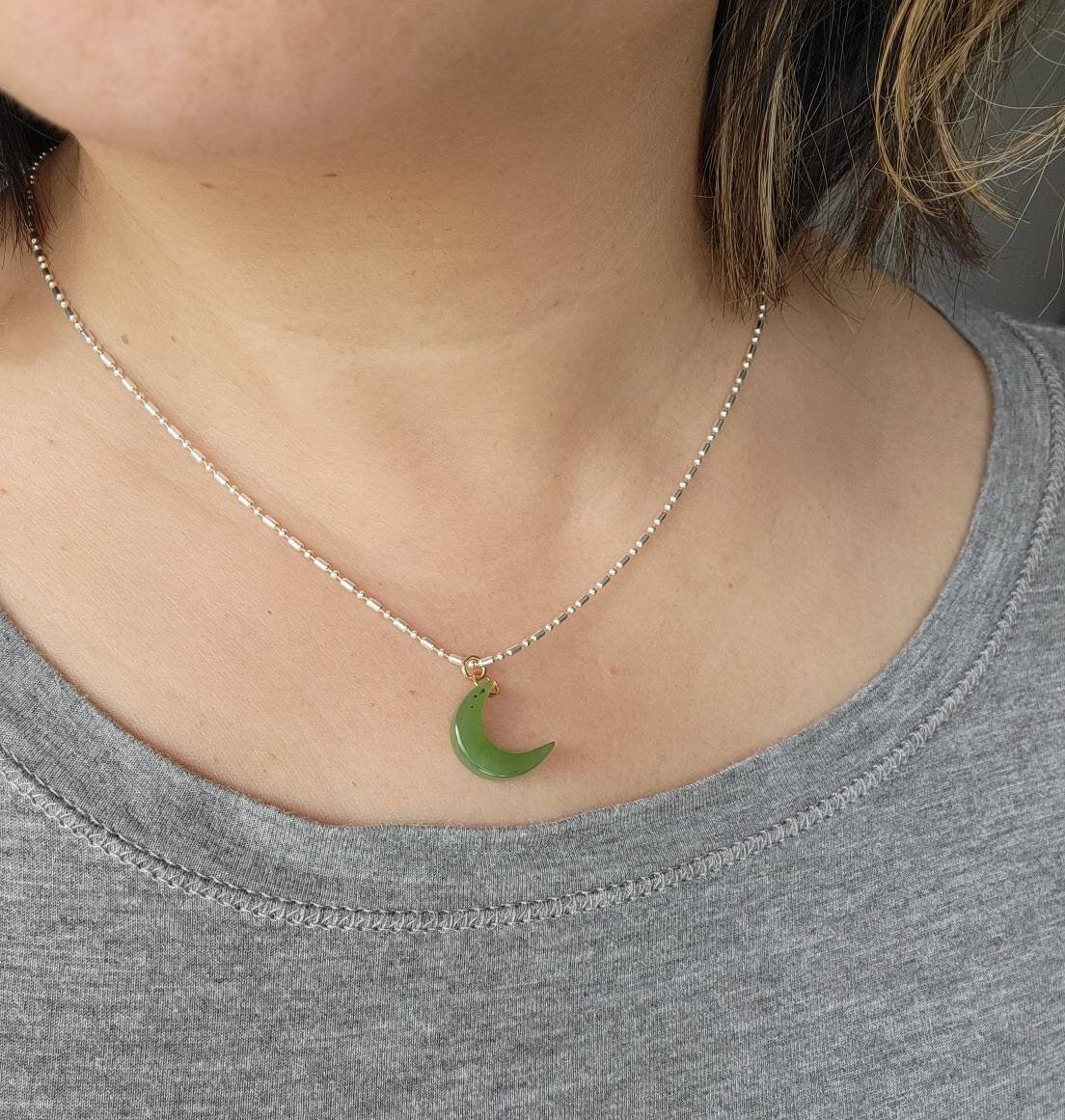 jade sickle moon charm
