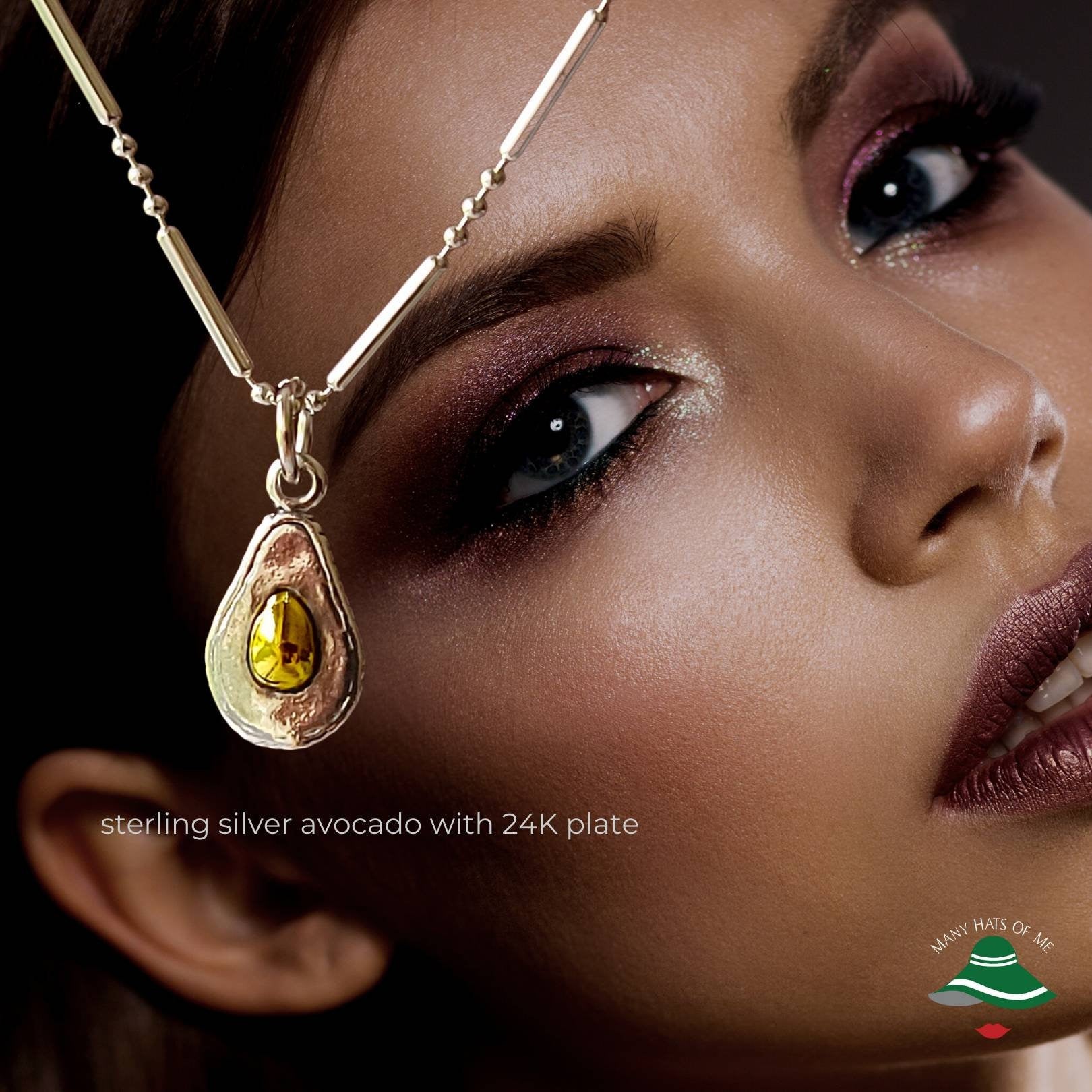silver and gold avocado charm pendant
