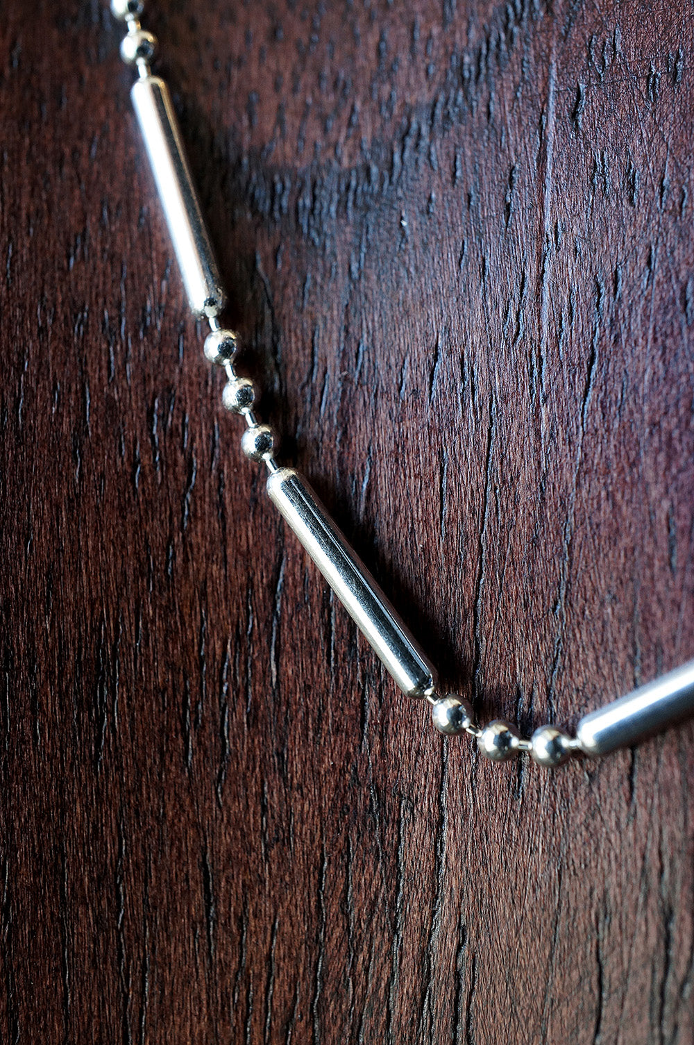 silver long bar and bead chain