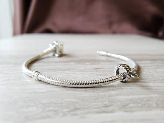 Silver charm bead holder compatible with Pandora and Trollbead