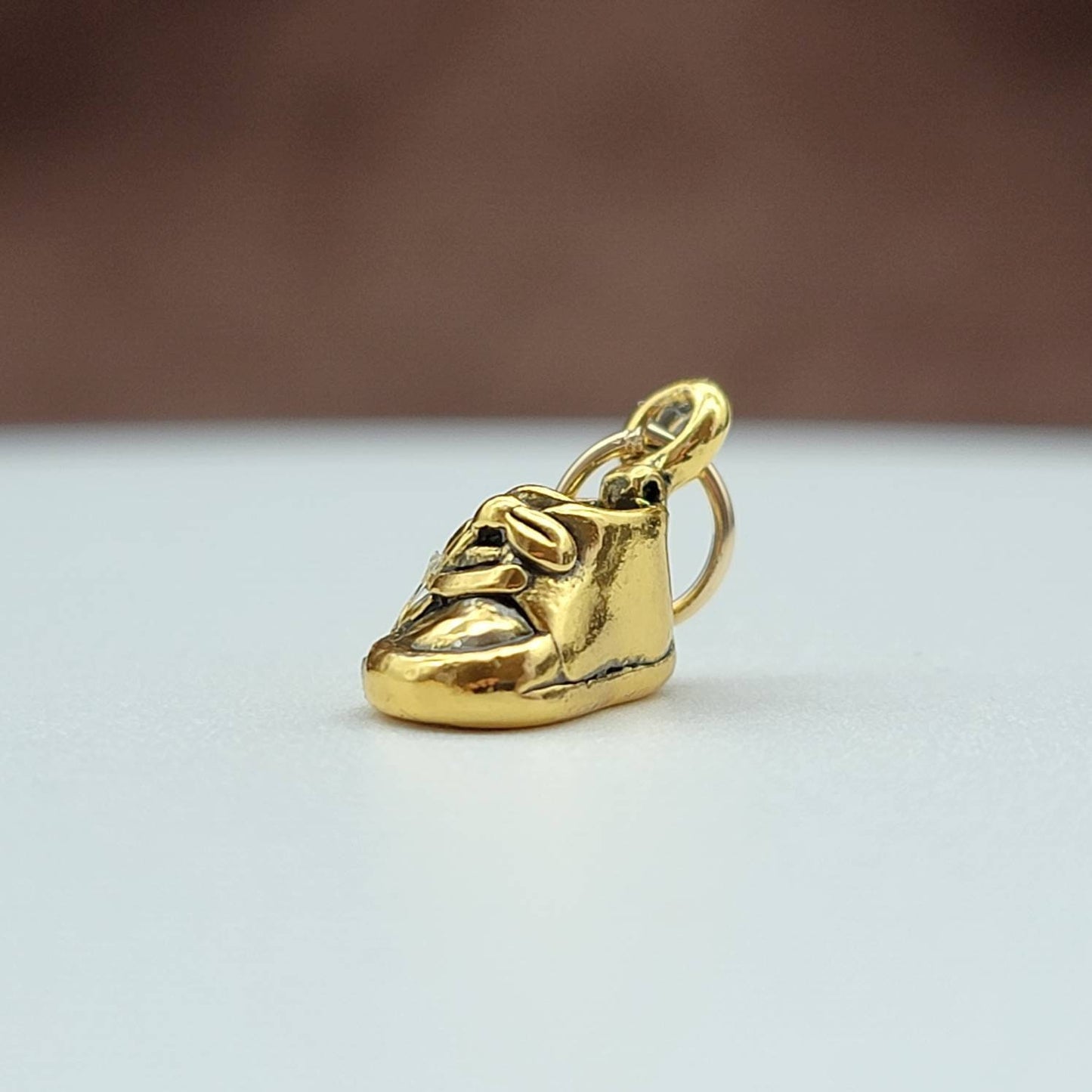 gold baby shoe charm pendant