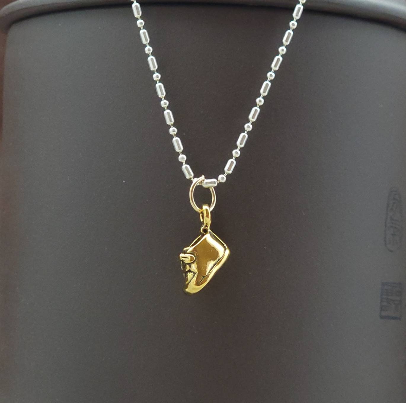 gold baby shoe charm pendant