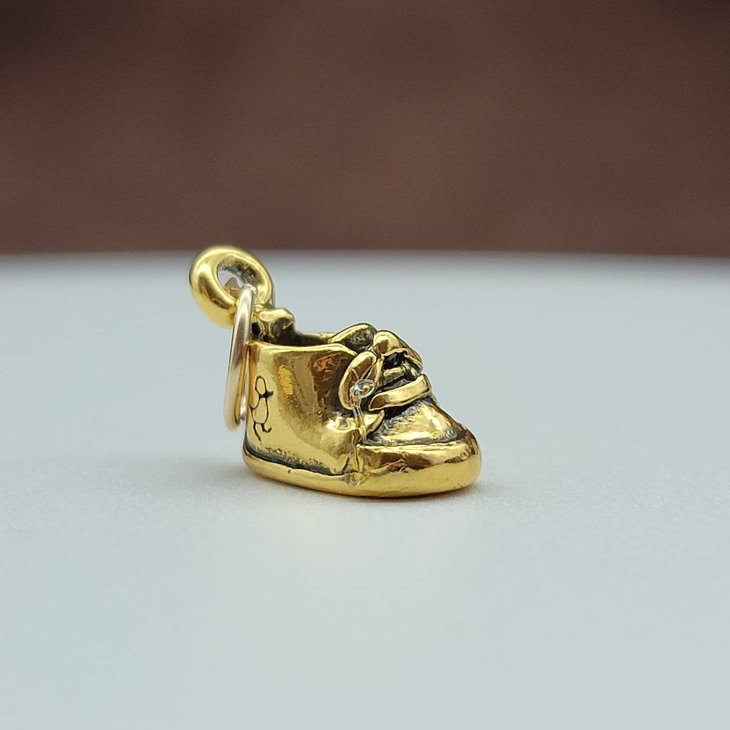 gold baby shoe charm pendant