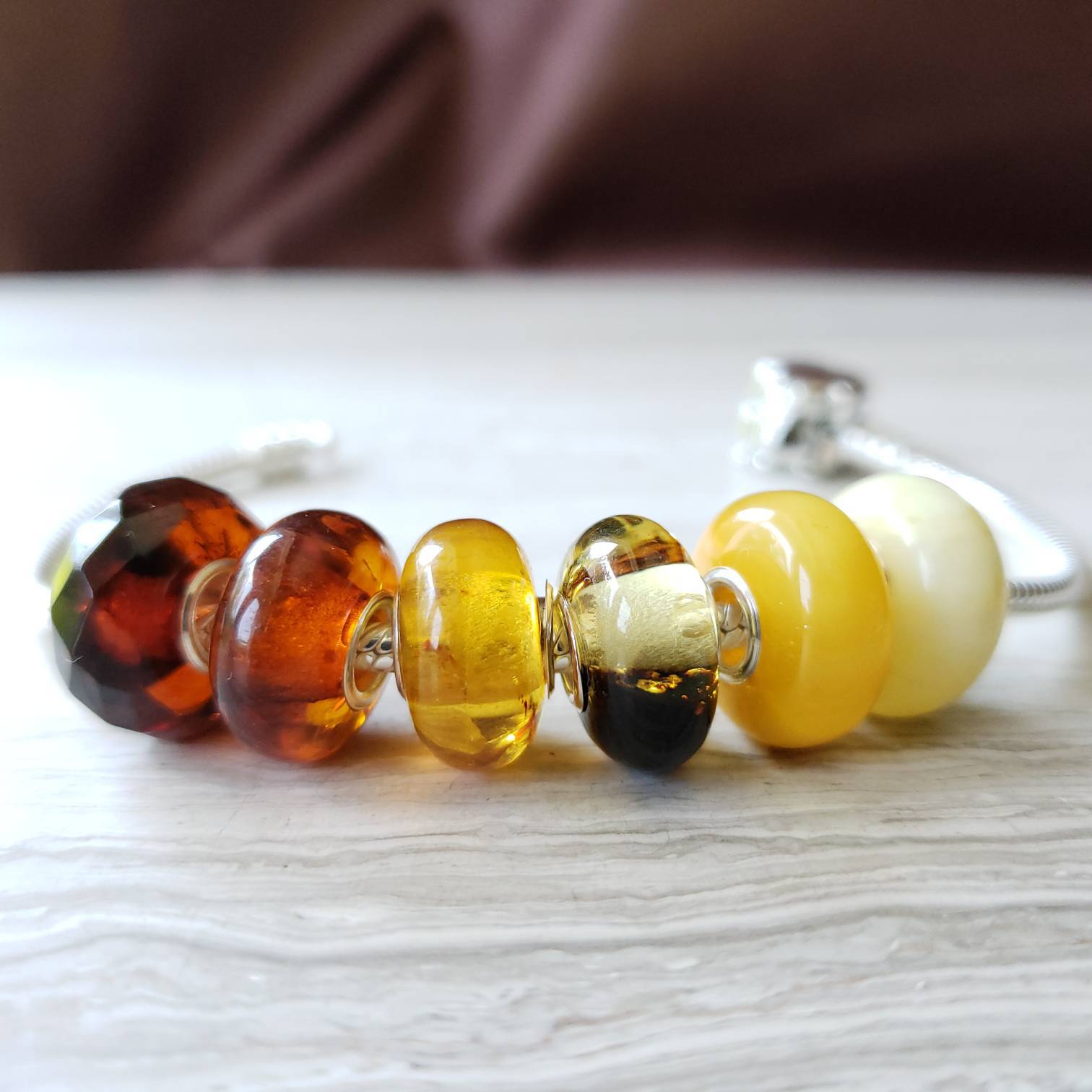 Baltic amber beads with Pandora braceley