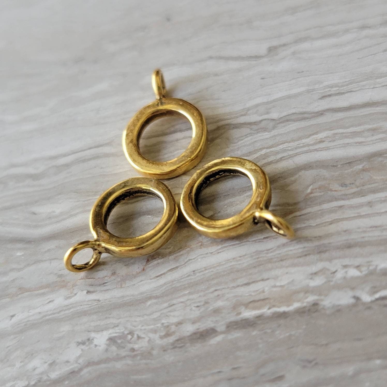 gold charm bead holder