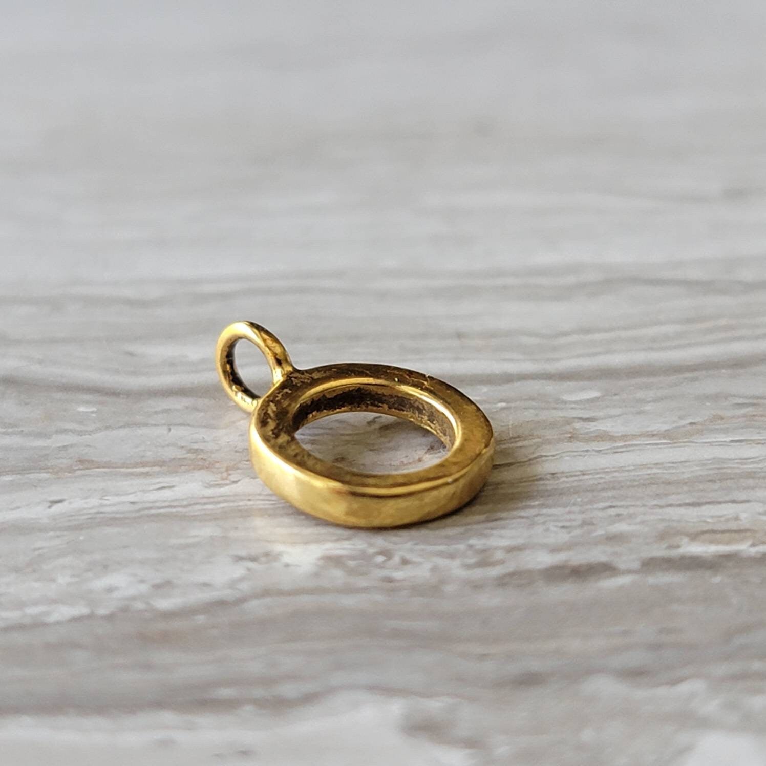 gold charm bead holder