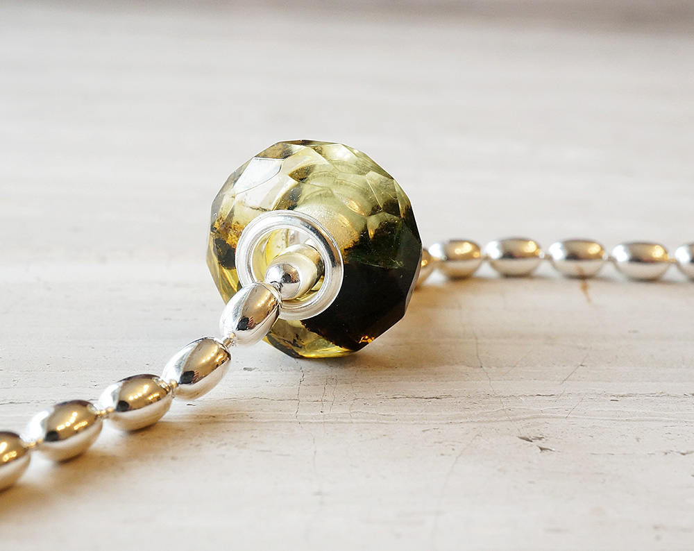 Black and white baltic amber bracelet bead polished facets