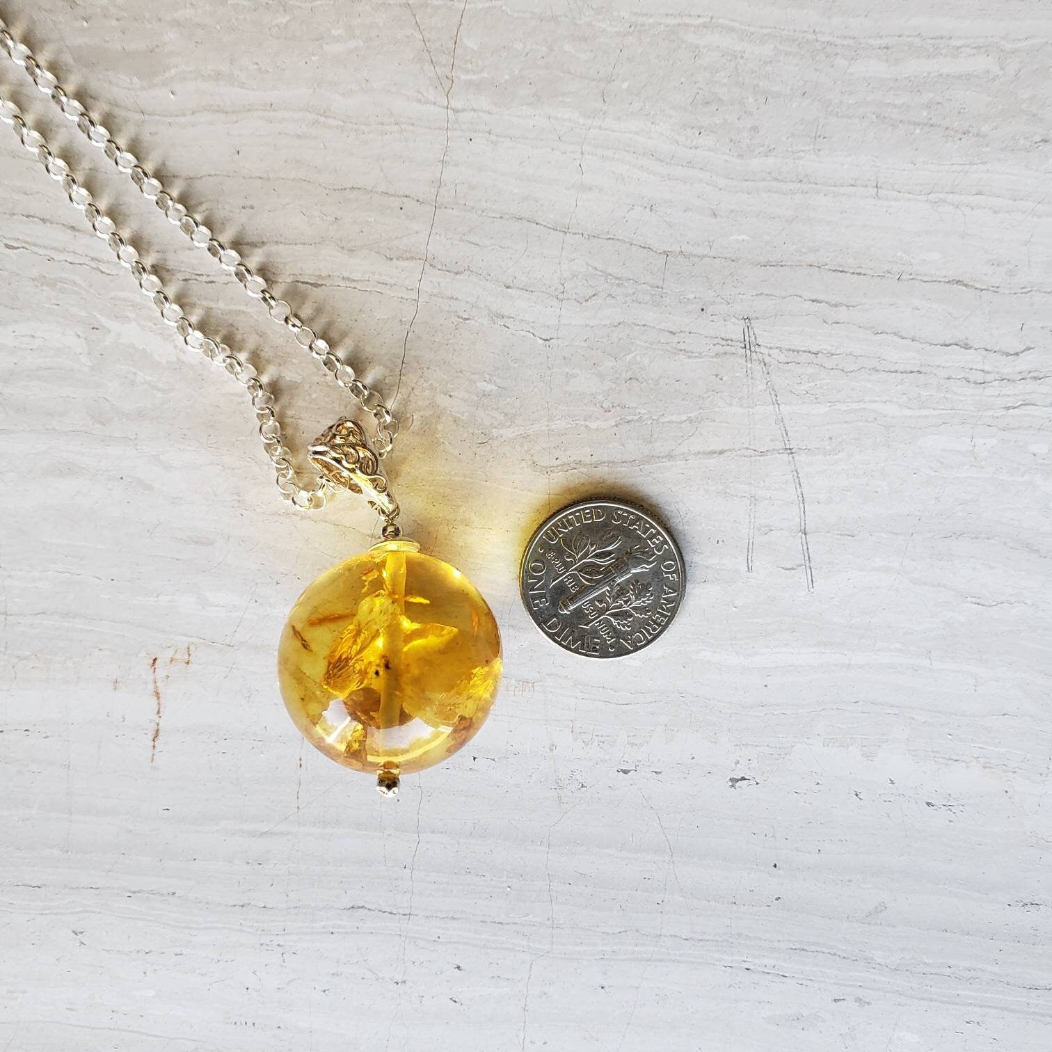 baltic amber ball pendant