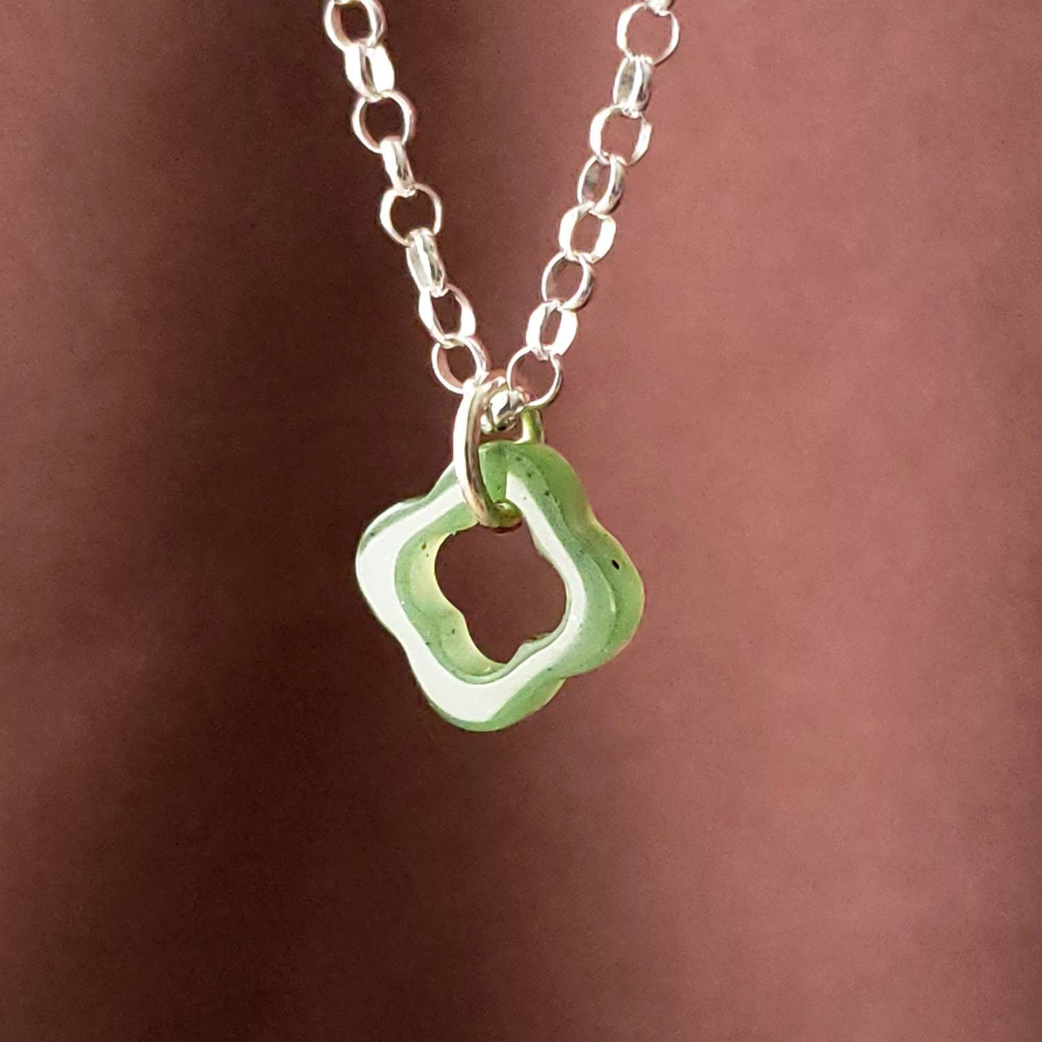 Jade floating 4 leaf clover charm pendant