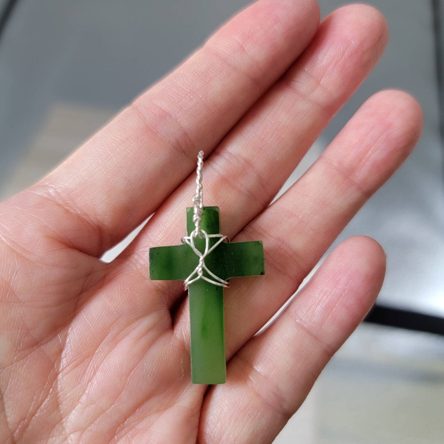 jade cross with silver cross bail